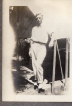 A man standing on a wood tent floor at Arden Shore